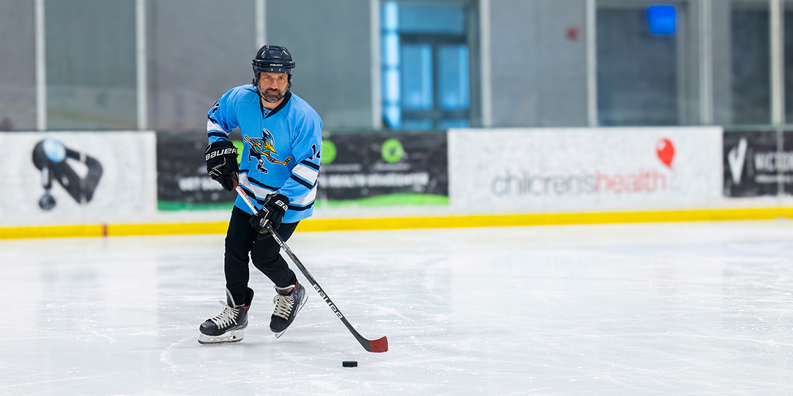 Chris playing hockey